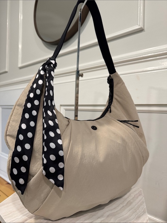 lululemon athletica Handbags - lululemon athletica Bag Beige Pleated Shoulder Bag 10L with Black Trim